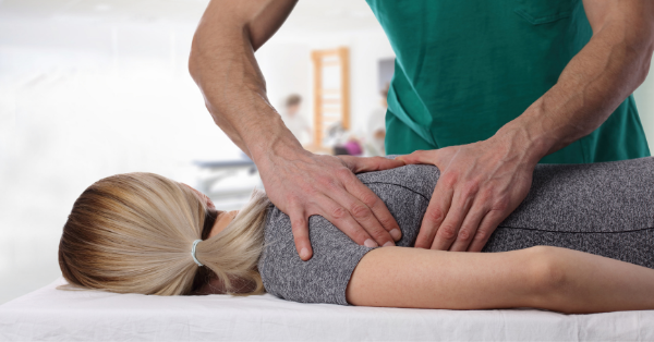 woman receiving chiropractic treatment 